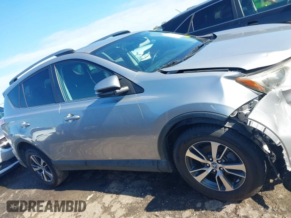 2018 Toyota RAV4 XLE with VIN 2T3WFREV6JW442859, listed as a IAAI auction lot 42252071 with 67,749 mi miles and . Bid and sale history available at DreamBid. Image 13.