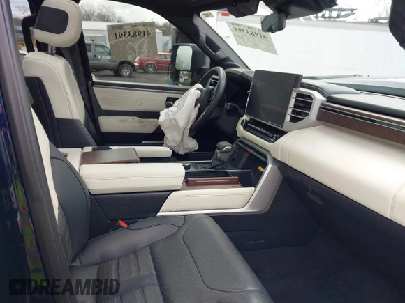 2022 Toyota Tundra Capstone Hybrid with VIN 5TFVC5DB5NX009829, listed as a IAAI auction lot 41983391 with 70,015 mi miles and . Bid and sale history available at DreamBid. Image 5.
