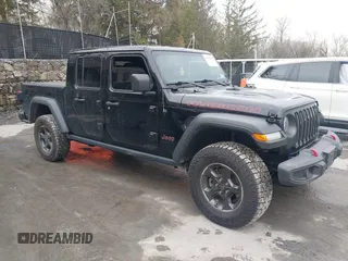 2022 Jeep Gladiator Rubicon z VIN 1C6JJTBG2NL153568, wystawiony jako IAAI lot #41601159 z przebiegiem 32 862 mil mil oraz . Historia ofert i sprzedaży dostępna na DreamBid. Obrazek 1.