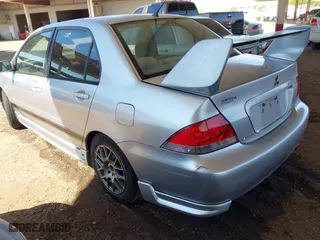 2005 Mitsubishi Lancer ES with VIN JA3AJ26E55U009131, listed as a IAAI auction lot 41980014 with 227,805 mi miles. Bid and sale history available at carsss.com. Image 3.