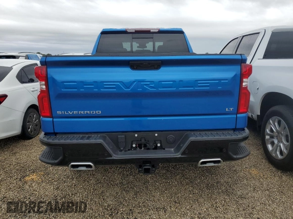2023 Chevrolet Silverado 1500 LT Trail Boss with VIN 3GCUDFE89PG291160, listed as a Copart auction lot 74374664 with 5,757 mi miles and Salvage Title. Bid and sale history available at DreamBid. Image 6.