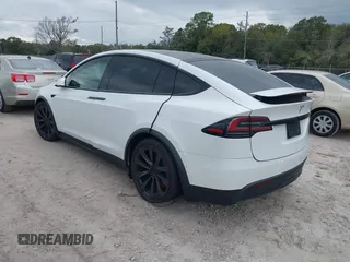 2022 Tesla Model X with VIN 7SAXCBE56NF364067, listed as a IAAI auction lot 40947378 with Not Provided miles and . Bid and sale history available at DreamBid. Image 3.