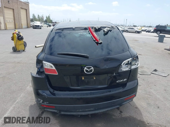 2010 Mazda CX-9 Grand Touring with VIN JM3TB2MV1A0203416, listed as a IAAI auction lot 42090500 with 131,659 mi miles and . Bid and sale history available at carsss.com. Image 16.