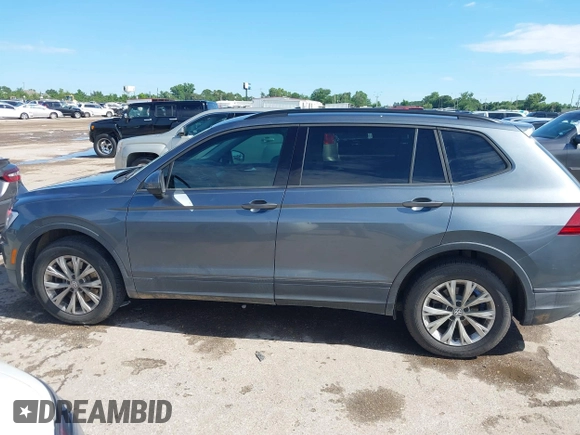 2019 Volkswagen Tiguan S with VIN 3VV1B7AX1KM085354, listed as a IAAI auction lot 42229851 with 85,169 mi miles and . Bid and sale history available at DreamBid. Image 14.
