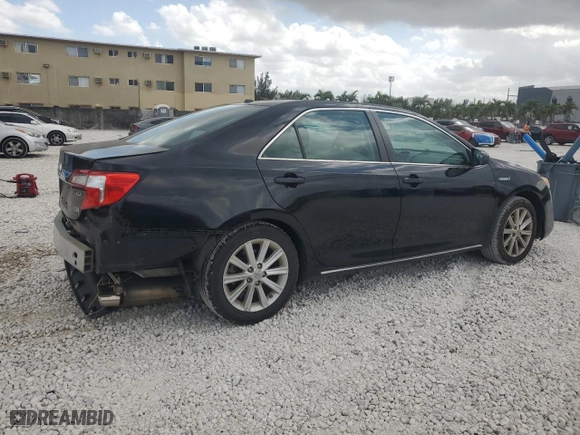 2012 Toyota Camry Hybrid XLE with VIN 4T1BD1FK8CU060564, listed as a Copart auction lot 51137405 with 185,072 mi miles and Salvage Title. Bid and sale history available at carsss.com. Image 3.