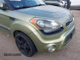 2012 Kia Soul + with VIN KNDJT2A69C7398380, listed as a IAAI auction lot 41523001 with 128,583 mi miles. Bid and sale history available at carsss.com. Image 13.