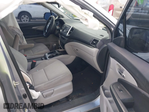 2016 Honda Pilot LX with VIN 5FNYF6H1XGB099987, listed as a IAAI auction lot 41556979 with 98,373 mi miles. Bid and sale history available at carsss.com. Image 5.