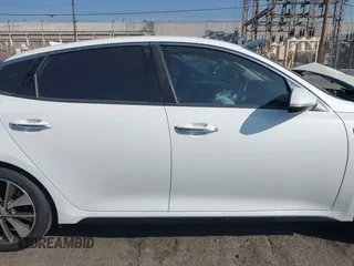 2016 Kia Optima SX Turbo with VIN 5XXGW4L2XGG043934, listed as a IAAI auction lot 40451940 with 86,386 mi miles and . Bid and sale history available at carsss.com. Image 13.