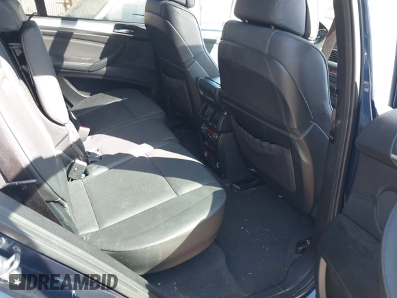 2012 BMW X5 50i with VIN 5UXZV8C57CL423223, listed as a IAAI auction lot 42606594 with 94,695 mi miles and . Bid and sale history available at DreamBid. Image 8.