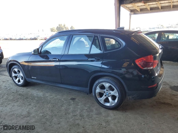 2013 BMW X1 28i with VIN WBAVM1C5XDVW44277, listed as a Copart auction lot 45601315 with 123,758 mi miles and Salvage Title. Bid and sale history available at carsss.com. Image 2.