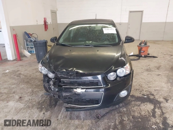 2016 Chevrolet Sonic LTZ z VIN 1G1JE6SB3G4150803, wystawiony jako IAAI lot #42007951 z przebiegiem 124 811 mil mil oraz . Historia ofert i sprzedaży dostępna na DreamBid. Obrazek 12.