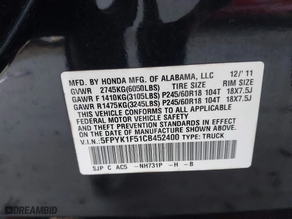 2012 Honda Ridgeline RTL with VIN 5FPYK1F51CB452400, listed as a IAAI auction lot 41853497 with 157,131 mi miles. Bid and sale history available at carsss.com. Image 9.