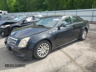 2011 Cadillac CTS Luxury z VIN 1G6DE5EY4B0102325, wystawiony jako Copart lot #57691775 z przebiegiem 157 711 mil mil oraz Szkoda całkowita • Salvage title. Historia ofert i sprzedaży dostępna na DreamBid. Obrazek 1.