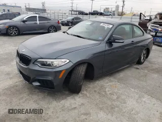 2016 BMW 2 Series M235i with VIN WBA1J7C52GV359572, listed as a Copart auction lot 38942884 with 65,456 mi miles. Bid and sale history available at carsss.com. Image 1.