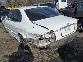 2003 Hyundai Sonata with VIN KMHWF25S13A830754, listed as a IAAI auction lot 41409518 with 207,849 mi miles. Bid and sale history available at carsss.com. Image 3.