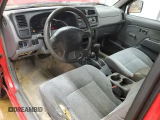 1999 Nissan Frontier XE with VIN 1N6ED26Y5XC308158, listed as a Copart auction lot 84320904 with 316,532 mi miles and Clean title. Bid and sale history available at DreamBid. Image 8.