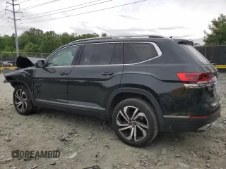 2021 Volkswagen Atlas SEL Premium z VIN 1V2TR2CA2MC513384, wystawiony jako Copart lot #56565305 z przebiegiem 61 815 mil mil oraz Szkoda całkowita • Salvage title. Historia ofert i sprzedaży dostępna na DreamBid. Obrazek 2.