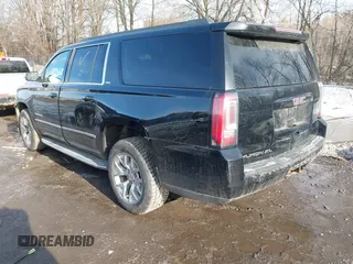 2015 GMC Yukon XL SLT with VIN 1GKS2HKC9FR159164, listed as a IAAI auction lot 41708822 with 136,730 mi miles. Bid and sale history available at carsss.com. Image 3.