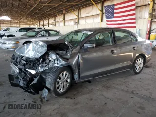 2012 Volkswagen Jetta SE z VIN 3VWDX7AJ3CM400209, wystawiony jako Copart lot #50618355 z przebiegiem 125 167 mil mil oraz Szkoda całkowita • Salvage title. Historia ofert i sprzedaży dostępna na DreamBid. Obrazek 1.