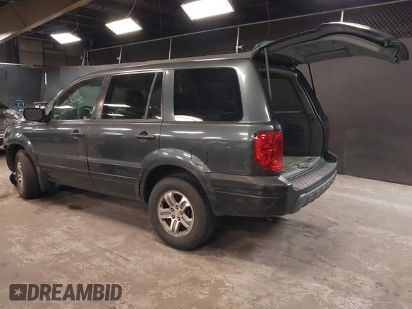 2003 Honda Pilot EX with VIN 2HKYF18603H581684, listed as a IAAI auction lot 42129330 with 186,138 mi miles and . Bid and sale history available at DreamBid. Image 3.