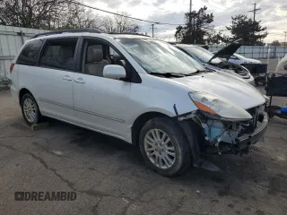 2010 Toyota Sienna XLE z VIN 5TDDK4CC8AS033402, wystawiony jako Copart lot #79083354 z przebiegiem 226 956 mil mil oraz Szkoda całkowita • Salvage title. Historia ofert i sprzedaży dostępna na DreamBid. Obrazek 4.