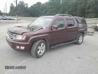 2011 Honda Ridgeline RTL with VIN 5FPYK1F58BB006887, listed as a Copart auction lot 75165964 with 153,615 mi miles and Salvage Title. Bid and sale history available at carsss.com. Image 1.