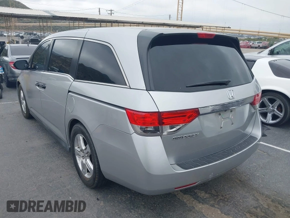 2014 Honda Odyssey LX z VIN 5FNRL5H28EB064426, wystawiony jako IAAI lot #42207634 z przebiegiem 169 706 mil mil oraz . Historia ofert i sprzedaży dostępna na DreamBid. Obrazek 3.