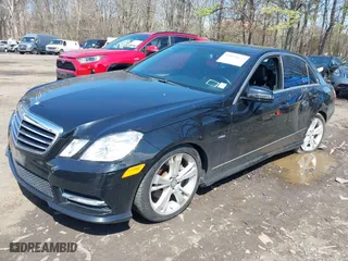 2012 Mercedes-Benz E-Class E 350 Luxury with VIN WDDHF8JB0CA614034, listed as a IAAI auction lot 42036672 with 65,049 mi miles. Bid and sale history available at carsss.com. Image 2.