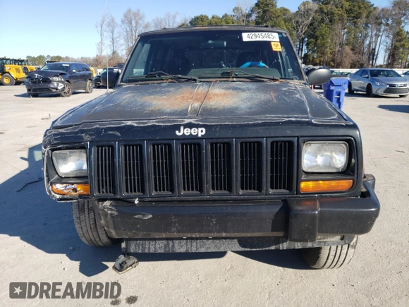 2000 Jeep Cherokee Classic with VIN 1J4FF58S3YL171454, listed as a Copart auction lot 42945485 with 218,721 mi miles and Salvage Title. Bid and sale history available at carsss.com. Image 5.