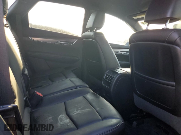 2022 Cadillac XT5 FWD Luxury z VIN 1GYKNAR47NZ100986, wystawiony jako Copart lot #83144574 z przebiegiem Nie podano mil oraz Nie do naprawy • Non repairable. Historia ofert i sprzedaży dostępna na DreamBid. Obrazek 11.