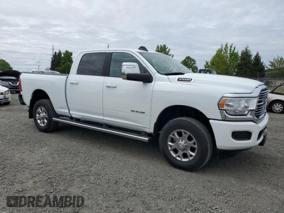 2023 Ram 2500 Laramie with VIN 3C6UR5FJ1PG634158, listed as a Copart auction lot 57164505 with 18,279 mi miles and Salvage title. Bid and sale history available at DreamBid. Image 4.