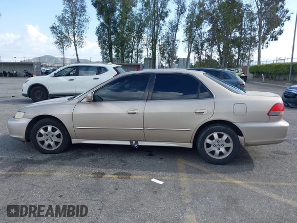 2001 Honda Accord EX z VIN 1HGCG66821A084618, wystawiony jako IAAI lot #41959020 z przebiegiem 272 671 mil mil oraz . Historia ofert i sprzedaży dostępna na DreamBid. Obrazek 14.