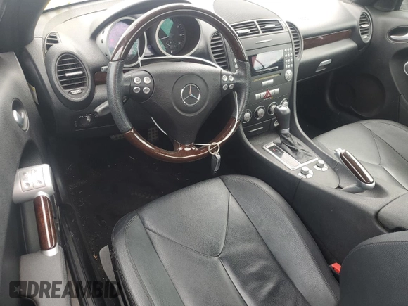 2007 Mercedes-Benz SLK-Class 3.0L with VIN WDBWK54F27F138919, listed as a Copart auction lot 72077514 with 64,519 mi miles and Salvage Title. Bid and sale history available at carsss.com. Image 8.