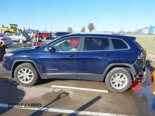 2015 Jeep Cherokee Latitude with VIN 1C4PJMCS0FW583658, listed as a IAAI auction lot 41106819 with 101,849 mi miles. Bid and sale history available at carsss.com. Image 14.