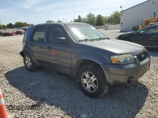 2005 Ford Escape Limited with VIN 1FMYU94175KB94533, listed as a Copart auction lot 71092124 with 156,992 mi miles and Salvage Title. Bid and sale history available at carsss.com. Image 4.
