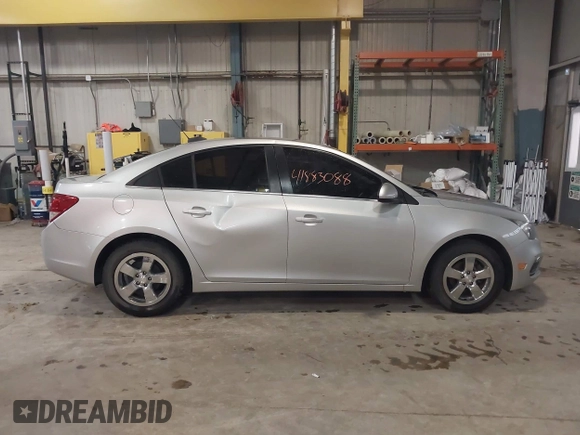 2015 Chevrolet Cruze LT with VIN 1G1PC5SB4F7132513, listed as a IAAI auction lot 41883088 with 131,185 mi miles and . Bid and sale history available at DreamBid. Image 14.