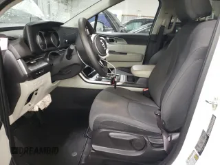 2023 Kia Carnival LX with VIN KNDNB4H39P6245635, listed as a Copart auction lot 77693694 with 26,752 mi miles and Salvage Title. Bid and sale history available at carsss.com. Image 7.