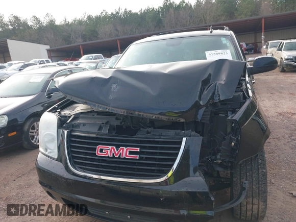 2012 GMC Yukon SLT with VIN 1GKS1CE06CR104447, listed as a IAAI auction lot 41589823 with 183,003 mi miles. Bid and sale history available at carsss.com. Image 12.