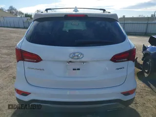 2017 Hyundai Santa Fe 2.4L z VIN 5XYZU3LB7HG438756, wystawiony jako IAAI lot #41480791 z przebiegiem 138 392 mil mil oraz . Historia ofert i sprzedaży dostępna na DreamBid. Obrazek 16.
