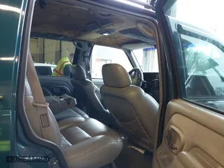 1997 Chevrolet Tahoe with VIN 1GNEK13R8VJ411512, listed as a IAAI auction lot 41583085 with 239,481 mi miles. Bid and sale history available at carsss.com. Image 8.