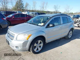 2012 Dodge Caliber SXT with VIN 1C3CDWDAXCD508338, listed as a IAAI auction lot 42091675 with 213,596 mi miles and . Bid and sale history available at carsss.com. Image 2.