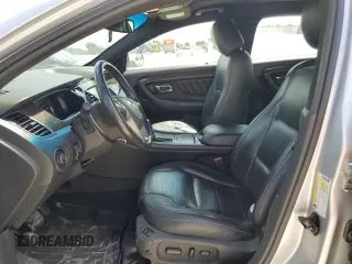 2013 Ford Taurus Limited z VIN 1FAHP2F80DG105499, wystawiony jako Copart lot #70792614 z przebiegiem 106 425 mil mil oraz Czysty tytuł • Clean title. Historia ofert i sprzedaży dostępna na DreamBid. Obrazek 7.