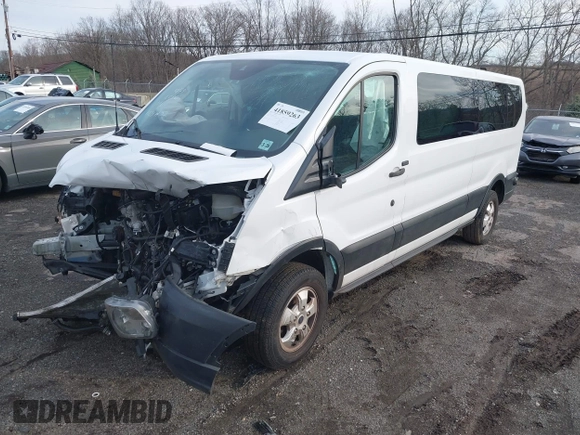 2019 Ford Transit Passenger XL z VIN 1FBZX2ZM2KKB63281, wystawiony jako IAAI lot #41859263 z przebiegiem 39 294 mil mil oraz . Historia ofert i sprzedaży dostępna na DreamBid. Obrazek 2.