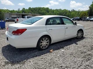 2010 Toyota Avalon XL with VIN 4T1BK3DB8AU370179, listed as a Copart auction lot 54670015 with 186,192 mi miles and Salvage Title. Bid and sale history available at DreamBid. Image 3.