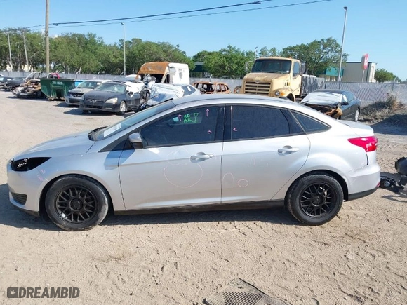 2016 Ford Focus SE with VIN 1FADP3F27GL320227, listed as a IAAI auction lot 41941368 with 128,527 mi miles. Bid and sale history available at carsss.com. Image 13.