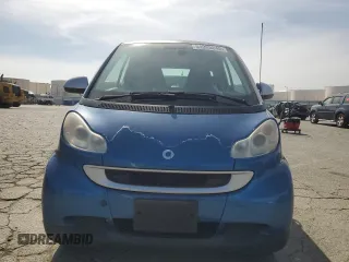 2009 Smart fortwo Pure with VIN WMEEJ31XX9K235766, listed as a Copart auction lot 54985845 with 75,708 mi miles and Clean Title. Bid and sale history available at carsss.com. Image 5.
