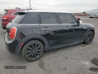 2017 MINI Hardtop 4 Door Cooper with VIN WMWXU1C30H2E19304, listed as a Copart auction lot 51008575 with 34,526 mi miles and Salvage Title. Bid and sale history available at DreamBid. Image 3.