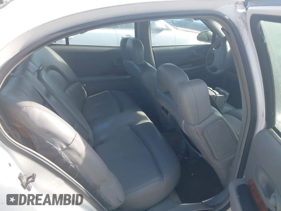 2001 Buick LeSabre Limited z VIN 1G4HR54K51U137832, wystawiony jako IAAI lot #42068730 z przebiegiem 262 640 mil mil oraz . Historia ofert i sprzedaży dostępna na DreamBid. Obrazek 8.