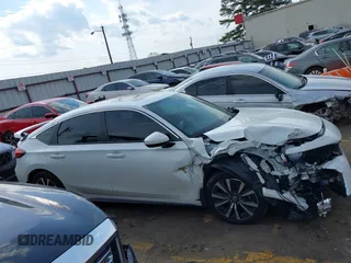 2024 Honda Civic EX-L z VIN 19XFL1H71RE027446, wystawiony jako IAAI lot #41687376 z przebiegiem 5 381 mil mil oraz . Historia ofert i sprzedaży dostępna na DreamBid. Obrazek 12.