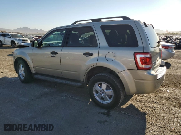 2011 Ford Escape XLT with VIN 1FMCU0D70BKA56239, listed as a Copart auction lot 69469464 with 59,782 mi miles and Salvage Title. Bid and sale history available at carsss.com. Image 2.